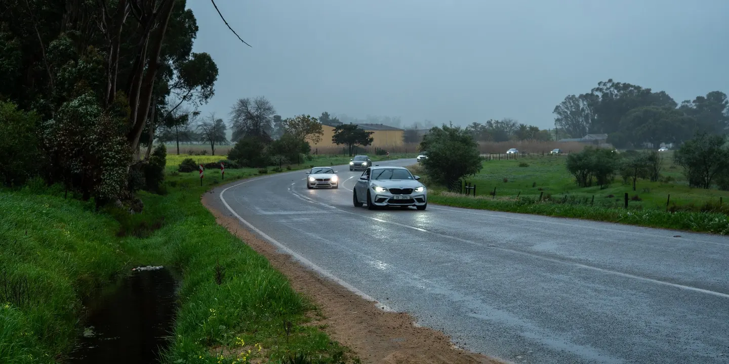 The Run 3 convoy on a wet country road